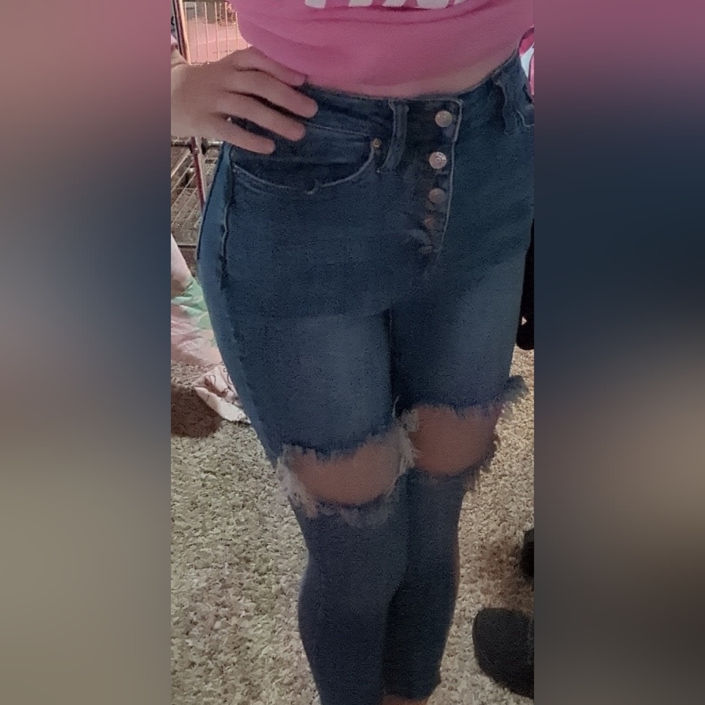 Riped blue jeans